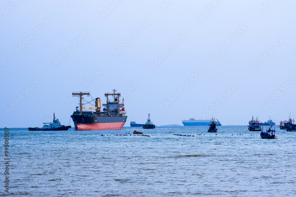 Fototapeta premium oil transport ship at the port industry in export logistics and international shipping by containers