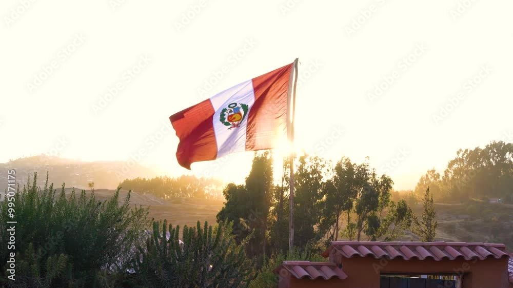Peruvian flag flying in the city of Cusco