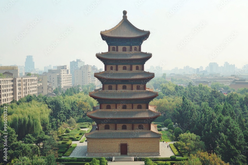 A massive brick pagoda with seven tiers, each with slightly upturned eaves A massive brick pagoda with seven tiers, each with slightly upturned eaves