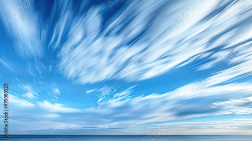 A blended image of clouds moving quickly across the sky, showcasing the passage of time and speed in a beautiful way.  photo
