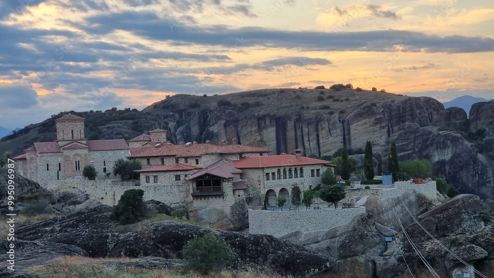 Fototapeta premium meteora churches in kalampaka city greece sunset time