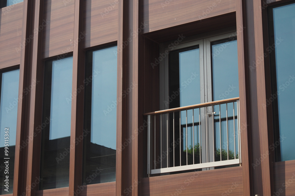 Contemporary Architectural Design Featuring a Beautiful Balcony and Expansive Large Windows Contemporary Architectural Design Featuring a Beautiful Balcony and Expansive Large Windows
