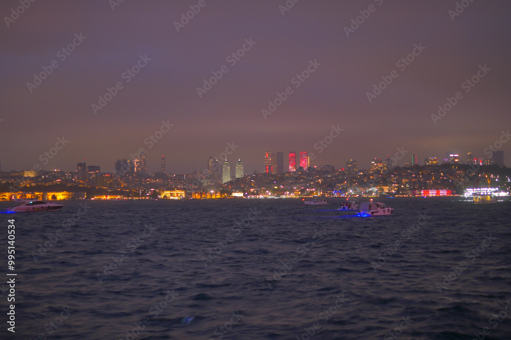 The Stunning Istanbul Night Skyline Features a Beautiful Display of Glowing Lights Over Water The Stunning Istanbul Night Skyline Features a Beautiful Display of Glowing Lights Over Water