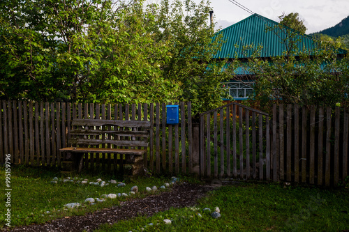 dilapidated houses in the village of Multa in Altai during sunset