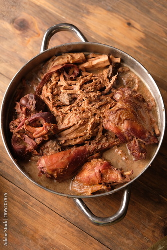 gudeg manggar. is a coconut flower vegetable cooked with coconut milk, brown sugar, coriander, and spices. Kampung Chicken. Yogyakarta cuisine. Indonesian food. photo