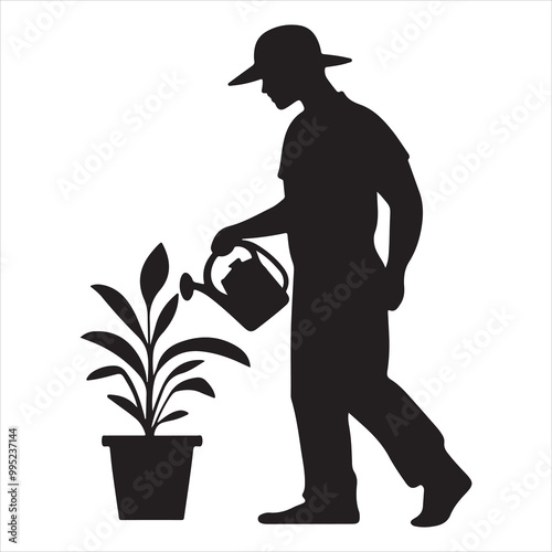 silhouette of a person holding a plant