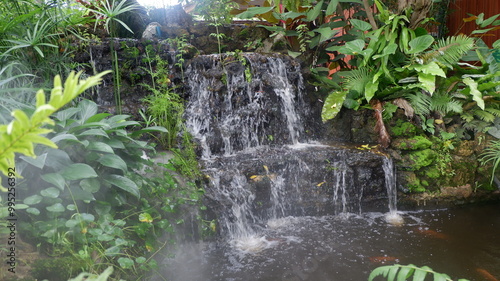 Beautiful artificial waterfall in the backyard