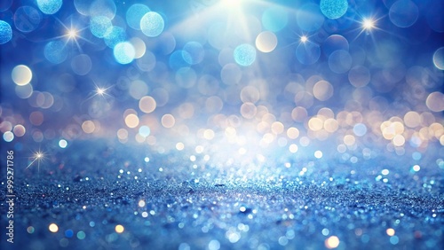 Delicate light sparkles on blue gradient background