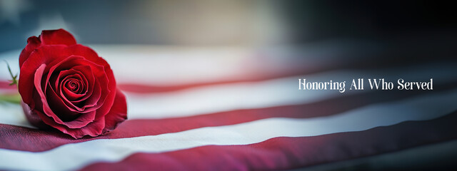 Red rose on American flag with tribute text
