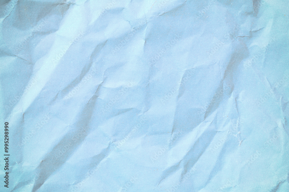 Obraz premium Crumpled Blue Paper Texture for Background Use