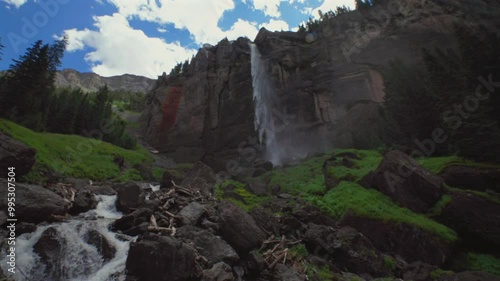 Mist spray Telluride Bridal Veil Falls Waterfall Black Bear Pass Road Colorado landscape pan left motion Ouray Ridgway Box Canyon cliffside hydropower house 4wd hiking blue sky boulders creek windy photo