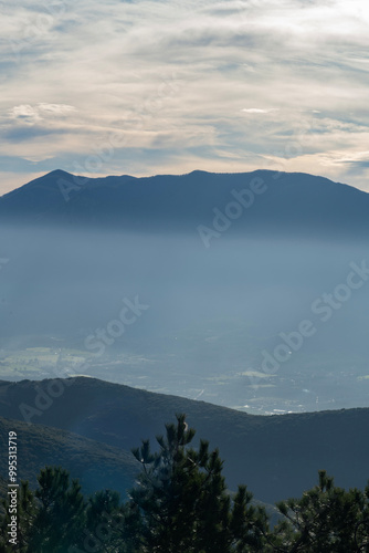 Mountain landscape at sunset. View of the mountains from above in the evening. Sunset view of the mountain range. Sunset in the mountains. Bursa trekking routes. Bursa, Türkiye.