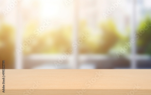 Empty of wood table top on blur of white clean abstract and blur interior background with bokeh.used for display or montage your products. banner.