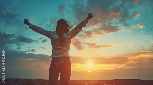 Obraz na płótnie Confident successful woman celebrating achievement with arms raised in a motivational and inspirational setting, symbolizing empowerment and personal growth. w salonie