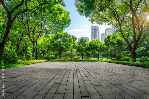 Fototapeta Naklejka Na Ścianę i Meble -  Green city park with square floor and tree in summer