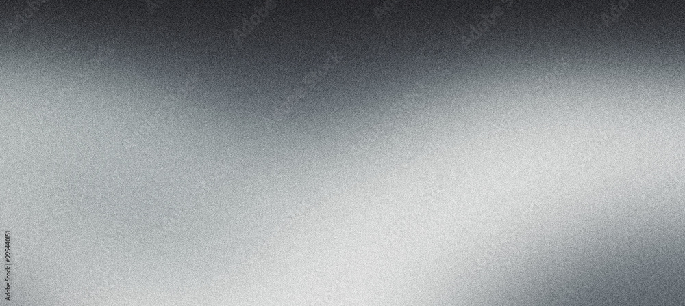 Sleek and modern abstract silver background with a grainy texture and subtle gradient from dark to light gray Sleek and modern abstract silver background with a grainy texture and subtle gradient from dark to light gray