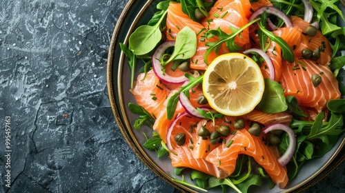 Smoked salmon salad with onion capers lemon arugula and rocket