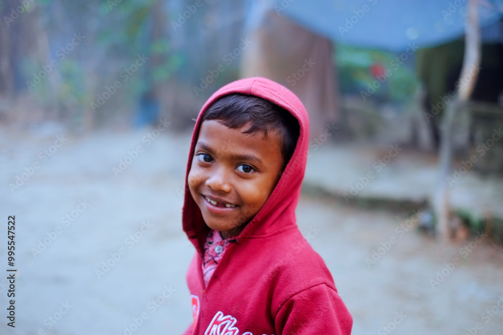 Portrait of a south asian young rural boy in foggy winter morning Portrait of a south asian young rural boy in foggy winter morning