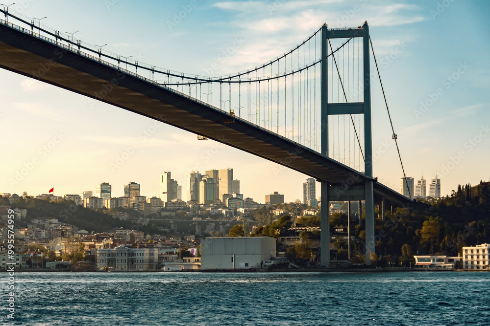 Fototapeta premium Bridge over the Bosphorus in Istanbul with city skyline in the background