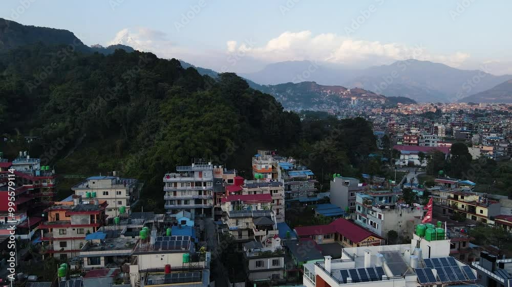 Pokhara, Nepal - A Panorama of the City With the Majestic Himalayan Mountains Rising in the Background - Aerial Pullback Shot Pokhara, Nepal - A Panorama of the City With the Majestic Himalayan Mountains Rising in the Background - Aerial Pullback Shot