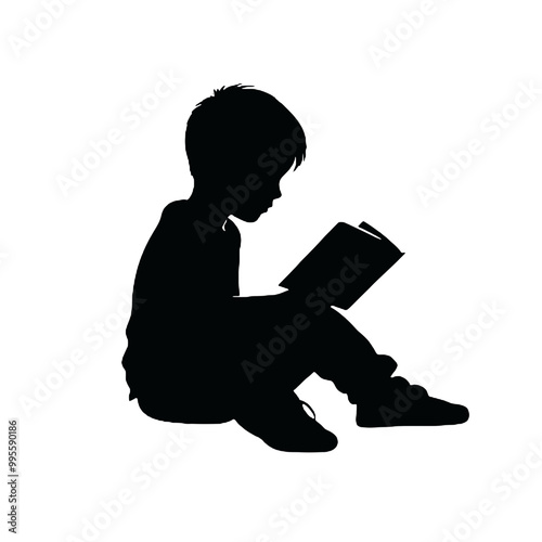 Silhouette of a young person reading a book