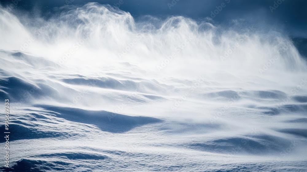 Fototapeta premium A serene winter landscape showcasing rolling snowdrifts and gentle wind patterns against a soft blue light.