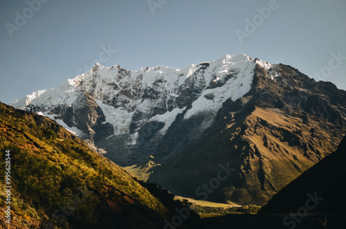 Panoramic View of the Andes in Peru with Hikers Trekking Towards a Glacier