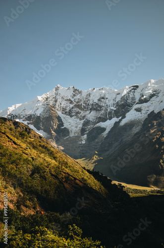 Panoramic View of the Andes in Peru with Hikers Trekking Towards a Glacier