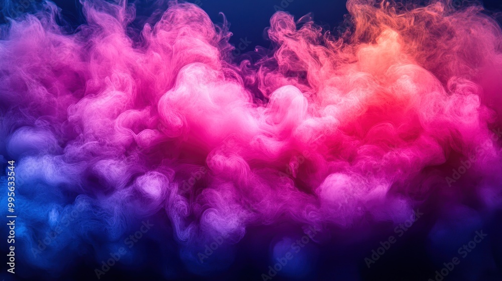 Swirling clouds of vibrant pink and purple smoke create a mesmerizing effect against a dark background Swirling clouds of vibrant pink and purple smoke create a mesmerizing effect against a dark background