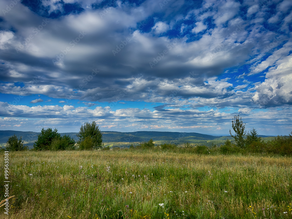 The landscape of Carpathian Mountains in the cloudy weather. Perfect weather condition in the summer season The landscape of Carpathian Mountains in the cloudy weather. Perfect weather condition in the summer season