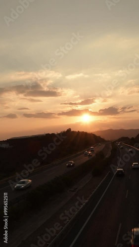 Sunset on a highway with traffic photo