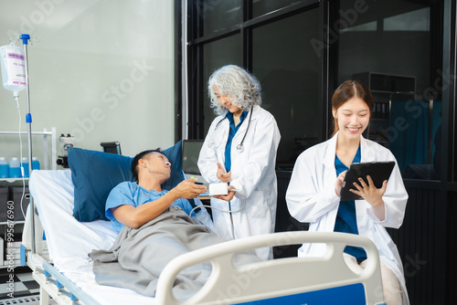 Doctor treatment patients in hospital room. Medical professionals help treat Sick people. Physical examination or flu. Concept Health care and Social Security