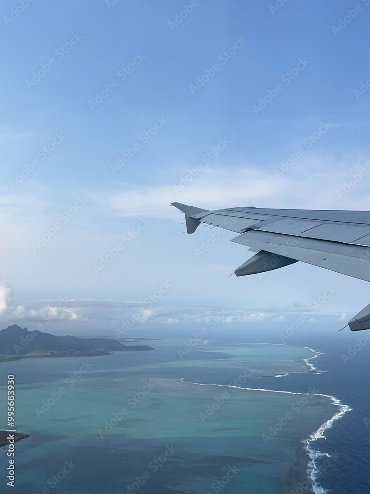 Stunning view from the airplane window. Indian ocean. Mauritius
