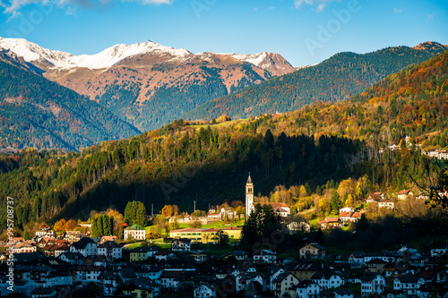 Autumn in Val Degano. Ovaro and its characteristic villages. The house with a hundred windows photo