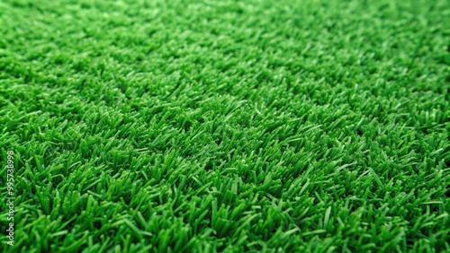 Artificial grass surface forming a perfect green texture, ideal for backgrounds about sports and gardening