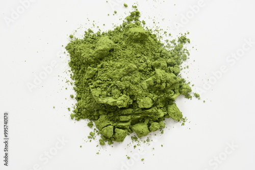 Pile of green matcha powder isolated on white, top view