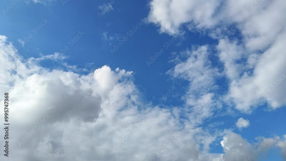 4K time-lapse of beautiful clouds with blue sky background, Blue sky with sun. cloud time lapse nature background 4K time-lapse of beautiful clouds with blue sky background, Blue sky with sun. cloud time lapse nature background