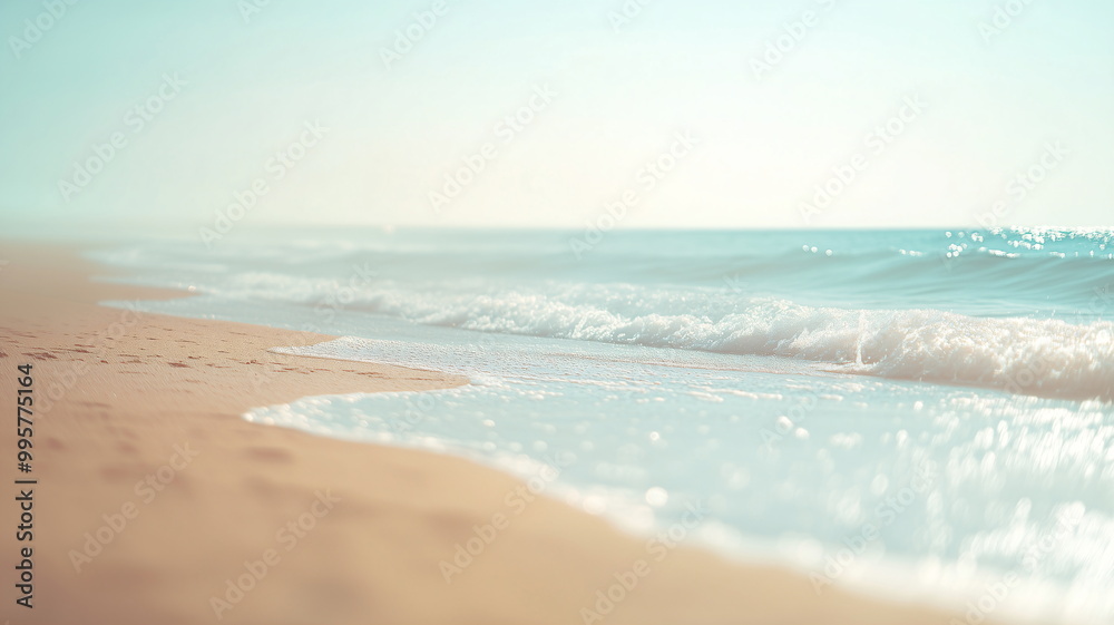Soft out-of-focus image of a peaceful beach with gentle waves and warm sunlight Soft out-of-focus image of a peaceful beach with gentle waves and warm sunlight