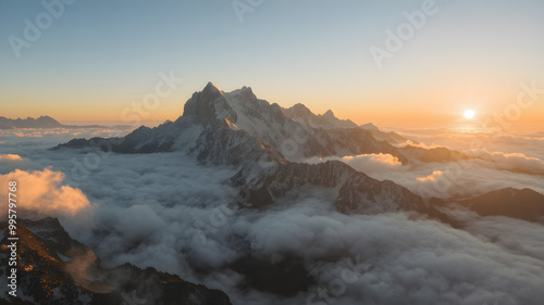 Scenic Aerial View of Mountains Above Clouds at Sunrise