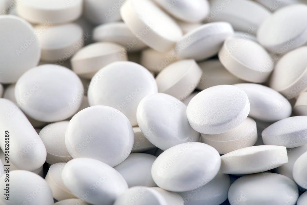 Heap of medicine white pills macro shot Heap of medicine white pills macro shot