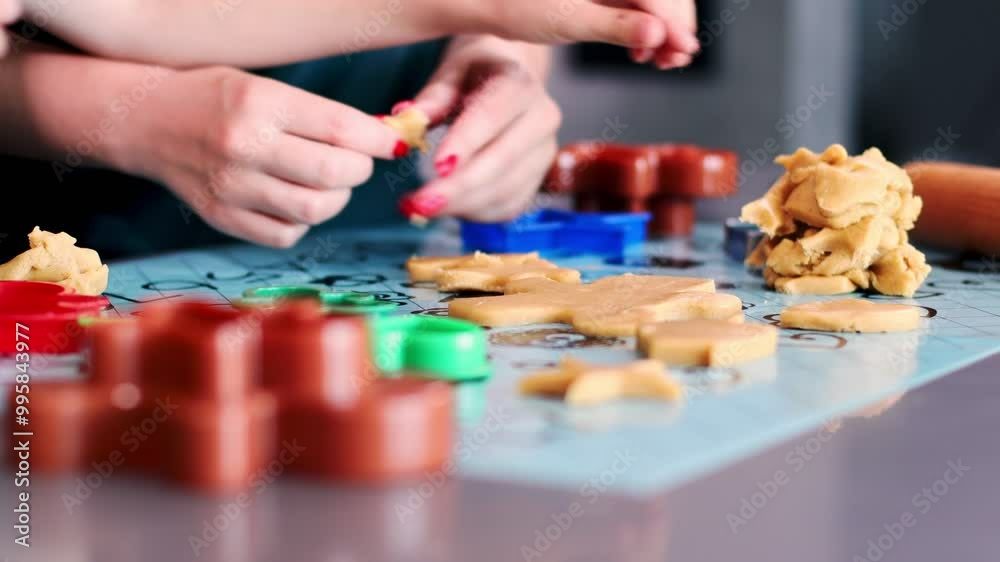 Mother and son making cookies together Mother and son making cookies together