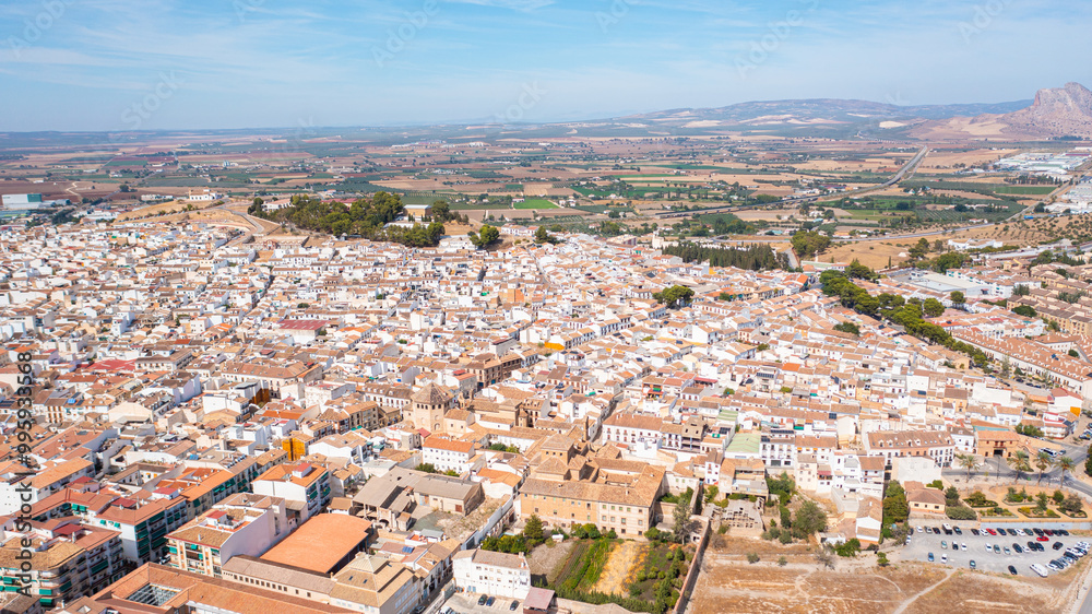 Aerial photo from drone to along the old town of Antequera, Spain overlooking the big fortress.Antequera, Andalusia, Spain Aerial photo from drone to along the old town of Antequera, Spain overlooking the big fortress.Antequera, Andalusia, Spain