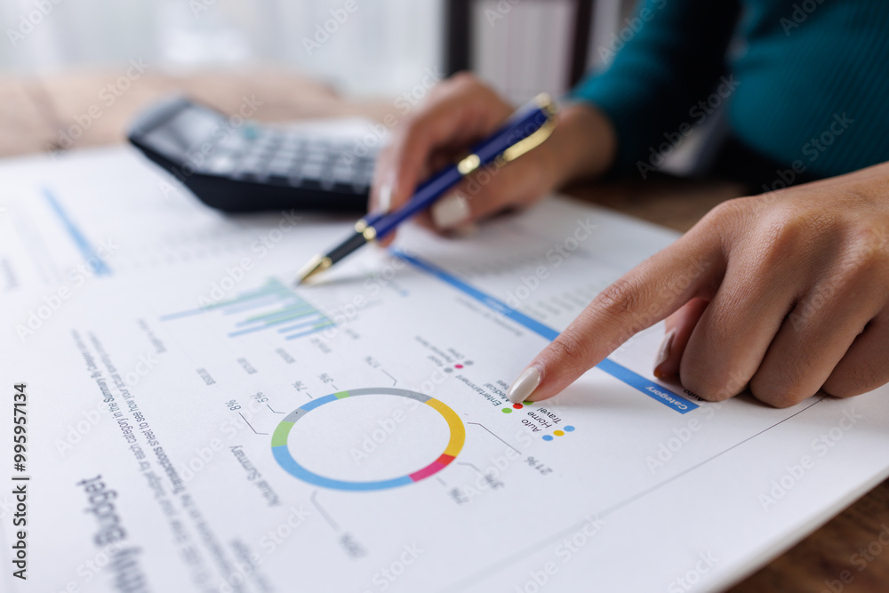 Business financing accounting banking concept. Business woman hand doing finances and calculate on desk about cost at home office. Woman working on desk with using calculator, finance accounting.
Business financing accounting banking concept. Business woman hand doing finances and calculate on desk about cost at home office. Woman working on desk with using calculator, finance accounting.