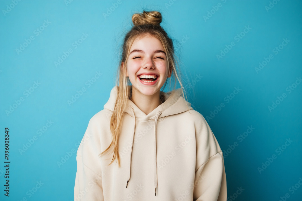 Blonde girl in hoodie with one emotion Blonde girl in hoodie with one emotion