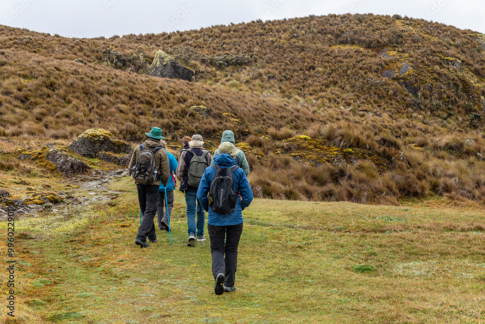 People hiking in Cajas national park, Cuenca, Ecuador.