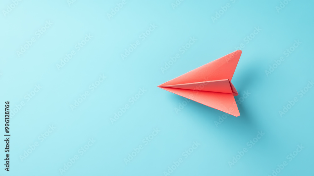 paper plane flying upward on light sky blue background evokes sense of freedom and creativity. Its vibrant color stands out beautifully against serene backdrop paper plane flying upward on light sky blue background evokes sense of freedom and creativity. Its vibrant color stands out beautifully against serene backdrop