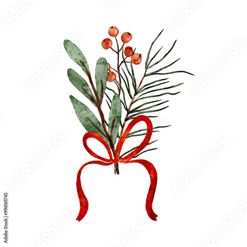 Christmas composition of holly, pine, and berries tied with a red ribbon for holiday decoration