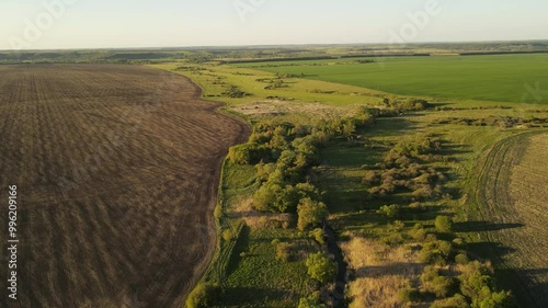 flying over the green countryside