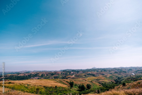 Panoramic view of sunset golden and blue sky nature background. Colorful dramatic sky with cloud at sunset.Sky background.Sky with clouds at sunset.