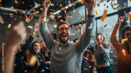 A manager rewarding a team for their hard work with a celebration in the office